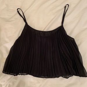 Accordion style tank drop with silver threads